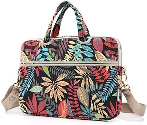 Laptoptas ontworpen voor laptops van 12,5 tot 14 inch met een gevulde binnenkant van bedrukt doek en meerdere draagmogelijkheden