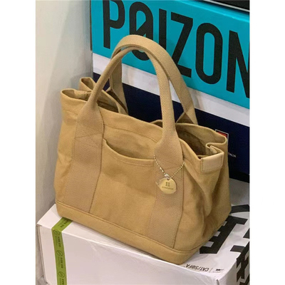 2024 Nieuwe high-end gevoel van NICHE design Canvas TOTE BAG Vrouwen BAG mode ALL VINTAGE enkel schouder kruislichaam tas