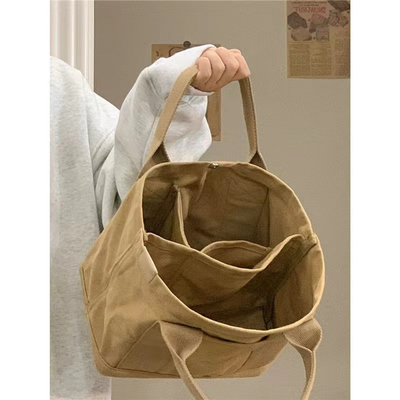2024 Nieuwe high-end gevoel van NICHE design Canvas TOTE BAG Vrouwen BAG mode ALL VINTAGE enkel schouder kruislichaam tas