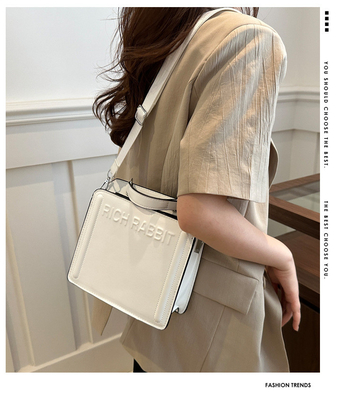 Eenvoudige mode brieftas dames nieuwe in commuter handtas klein vierkant tas senior textuur breed schouderband kruislichaam