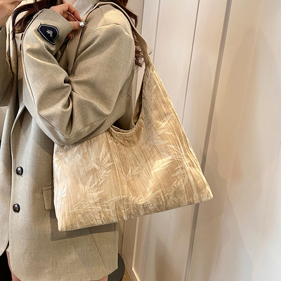 Nieuwe Chinese stijl grote capaciteit okseltas trend nieuwe mode middeleeuwse schoudertas vrouwelijke minderheid pendelganger Tote tas