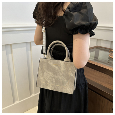 VINTAGE CHIC TEXTURED LETTER TOTE BAG VrouwenBAG 2024 Nieuwe grote capaciteit mode handtas breedband schoudertas
