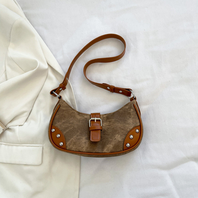 Franse mode Casual onderarmzak Vrouwen 2024 Nieuwe textuur BAGUETTE BAG SIMPLE COLOR PATCHWORK SCHULTERBAG TIDE