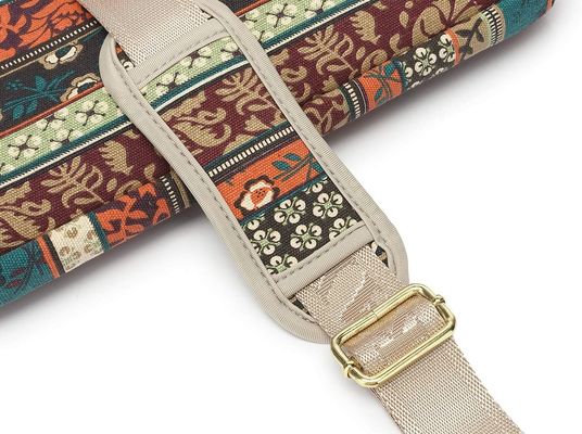 Laptoptas ontworpen voor laptops van 12,5 tot 14 inch met een gevulde binnenkant van bedrukt doek en meerdere draagmogelijkheden