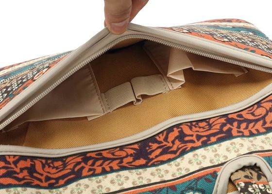 Laptoptas ontworpen voor laptops van 12,5 tot 14 inch met een gevulde binnenkant van bedrukt doek en meerdere draagmogelijkheden